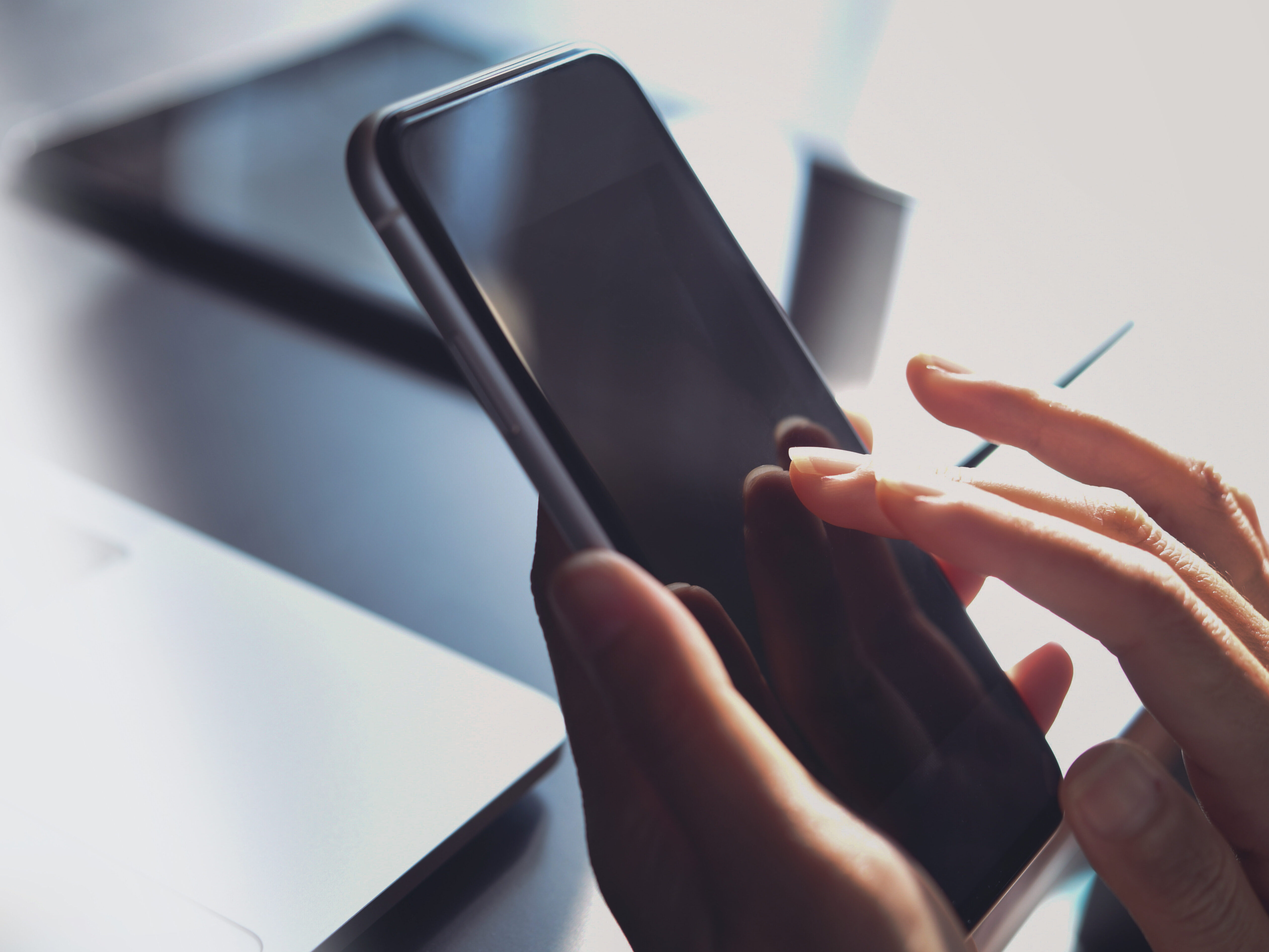 Close-up, business woman using smartphone, touching on screen, s